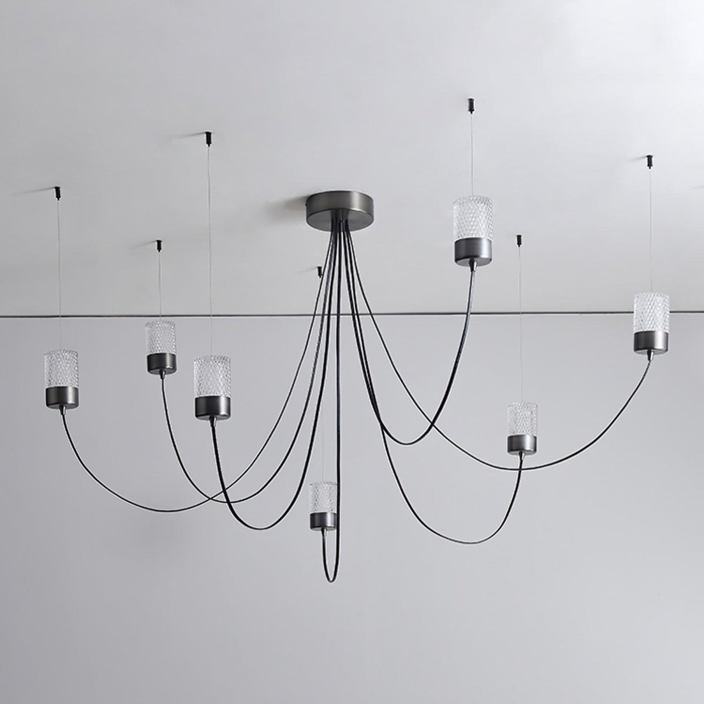Elegant Swaying Chandelier with Adjustable Height and LED Lighting