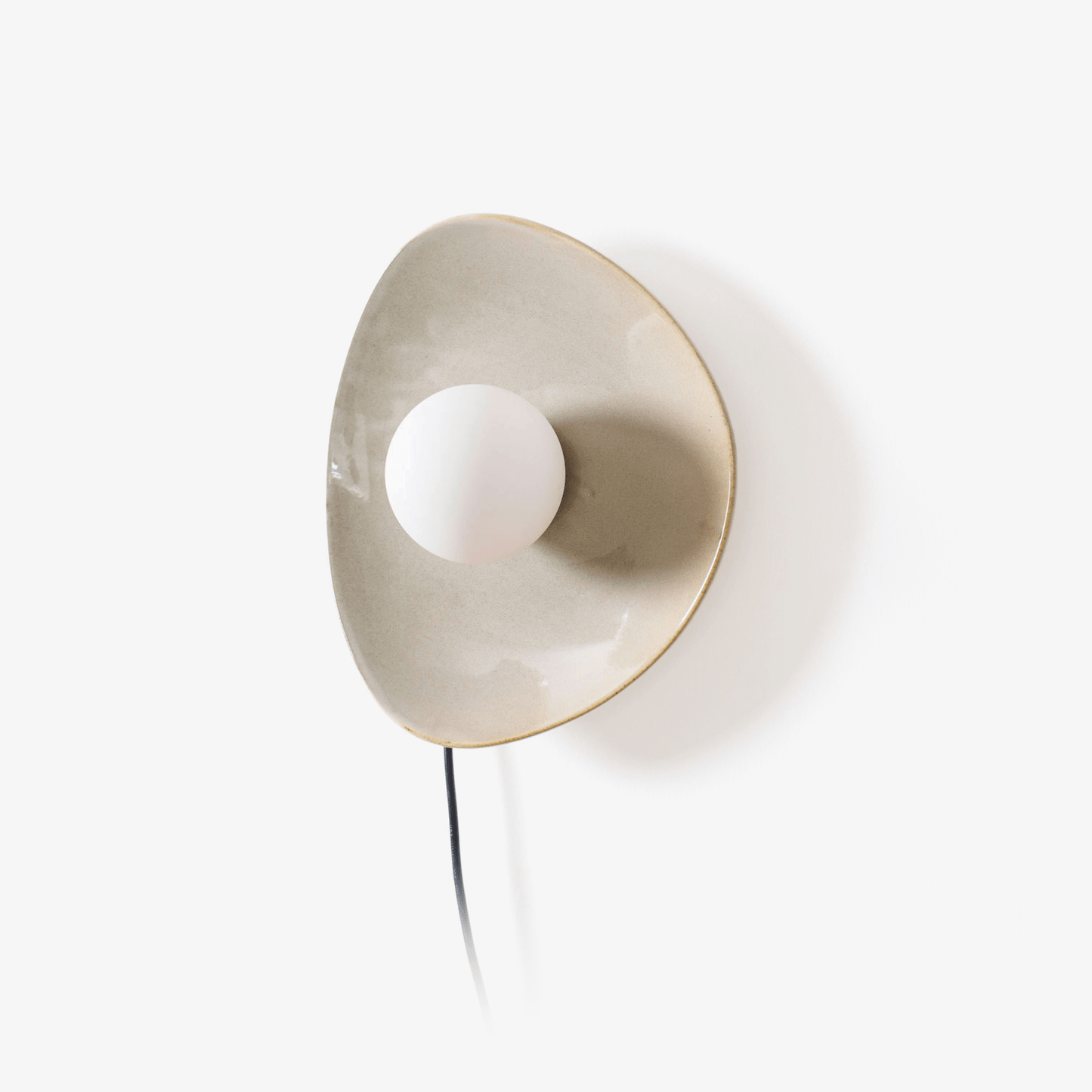 Pebble Disc Plug-in Wall Light with Adjustable Brightness & Energy Eff