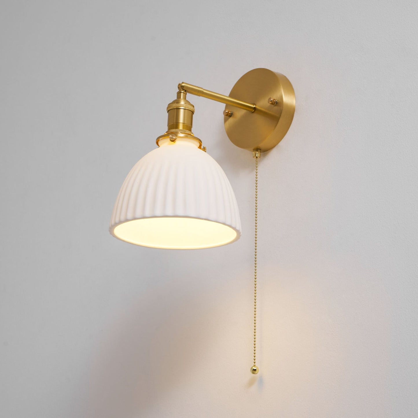 Brass Pleated Ceramic Wall Lamp - Elegant Design with Adjustable Light