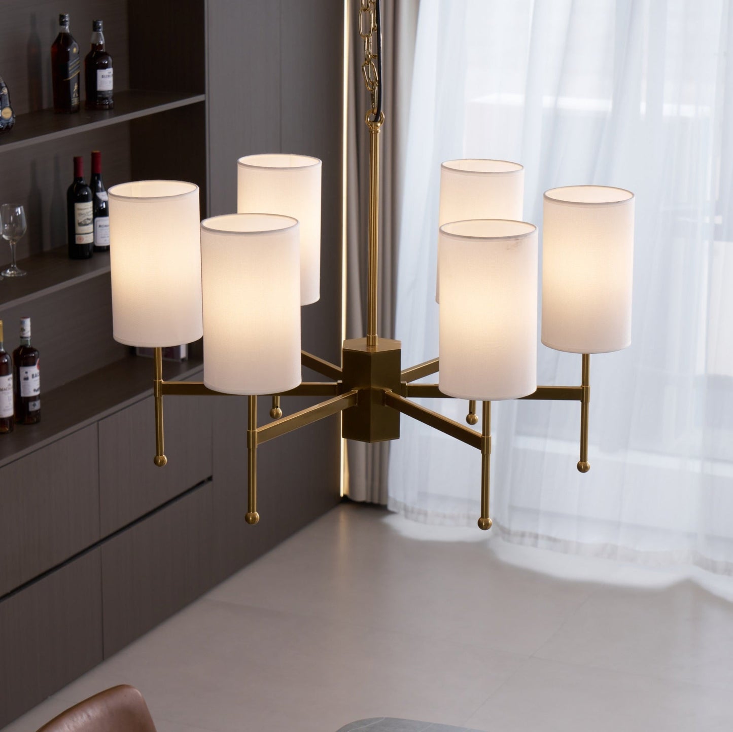 Brass Chandelier with Adjustable Height and Elegant Crystal Accents