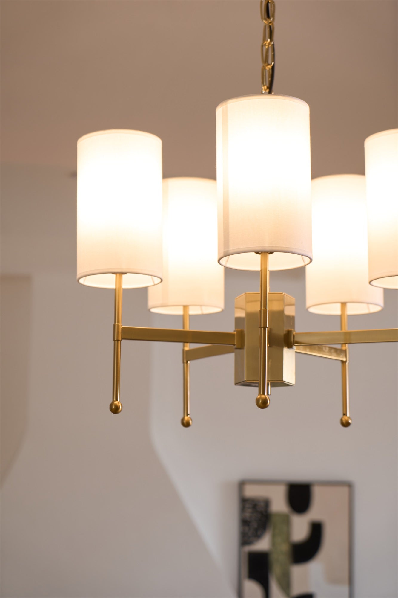 Brass Chandelier with Adjustable Height and Elegant Crystal Accents