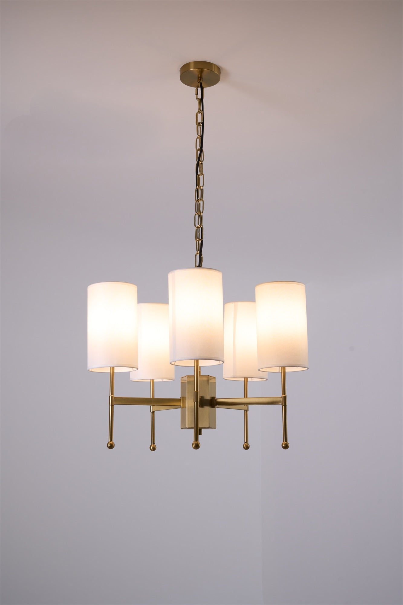 Brass Chandelier with Adjustable Height and Elegant Crystal Accents