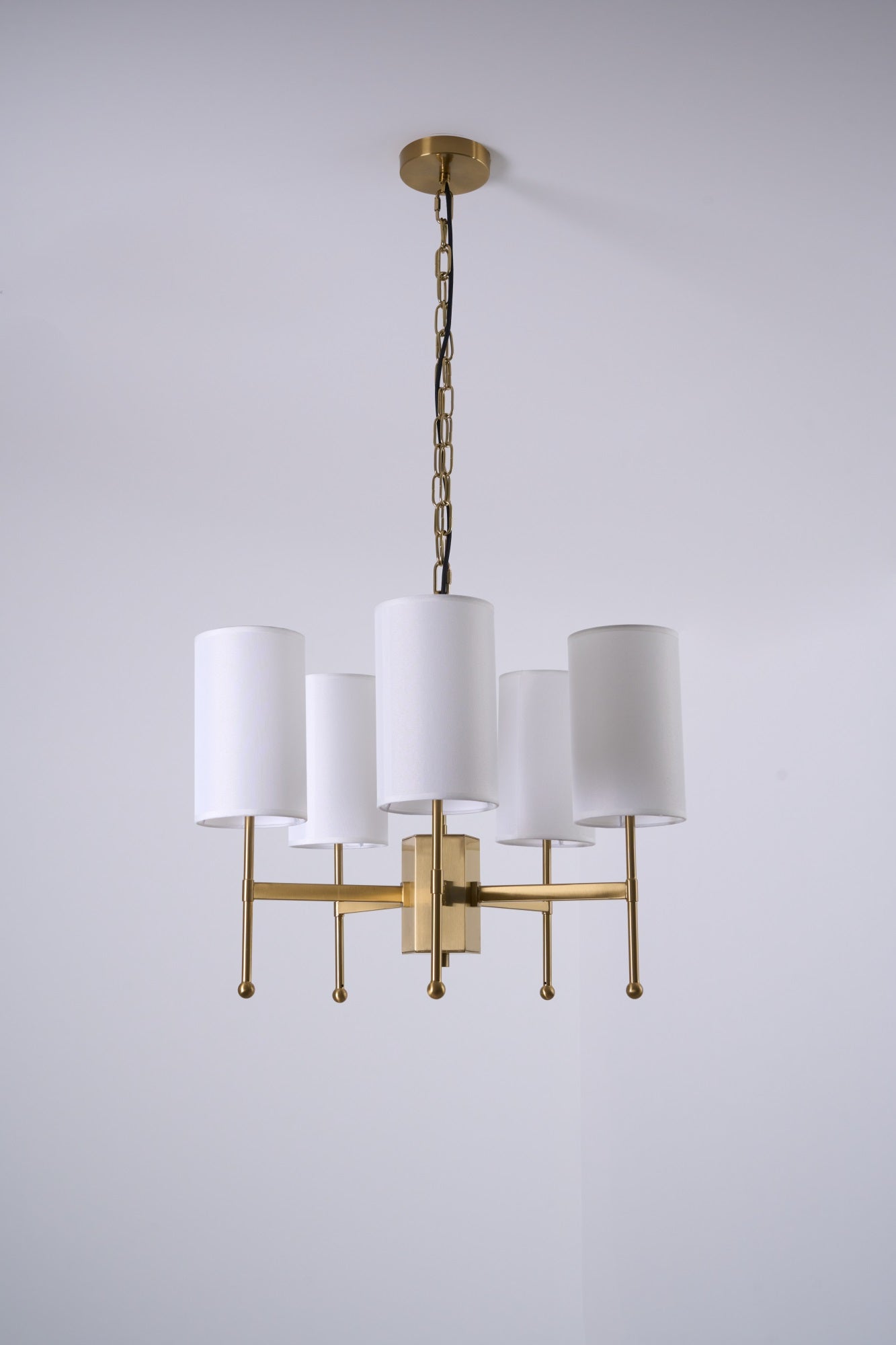 Brass Chandelier with Adjustable Height and Elegant Crystal Accents