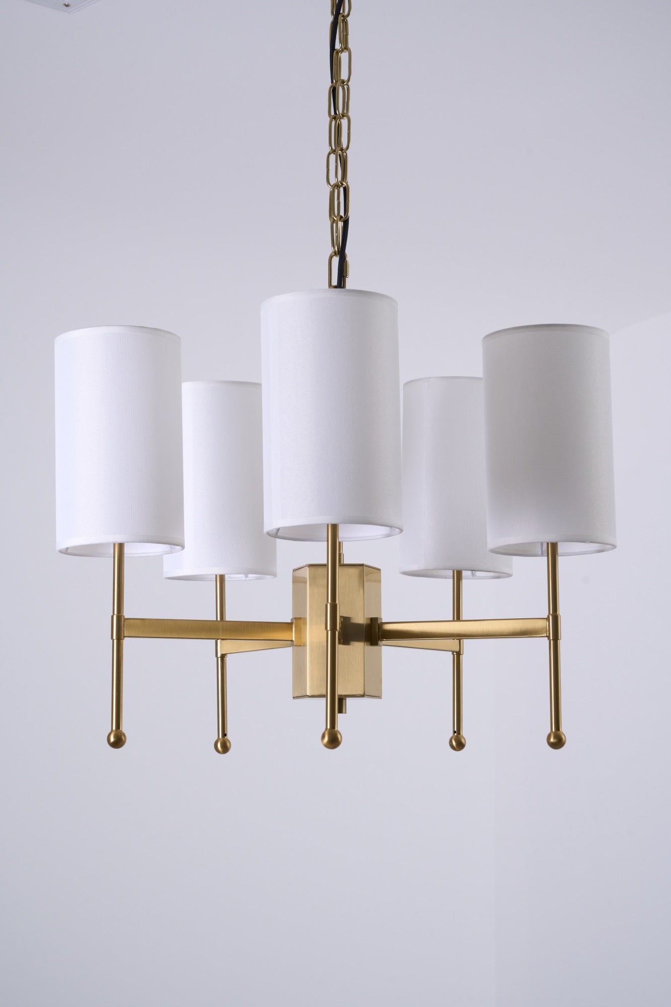 Brass Chandelier with Adjustable Height and Elegant Crystal Accents