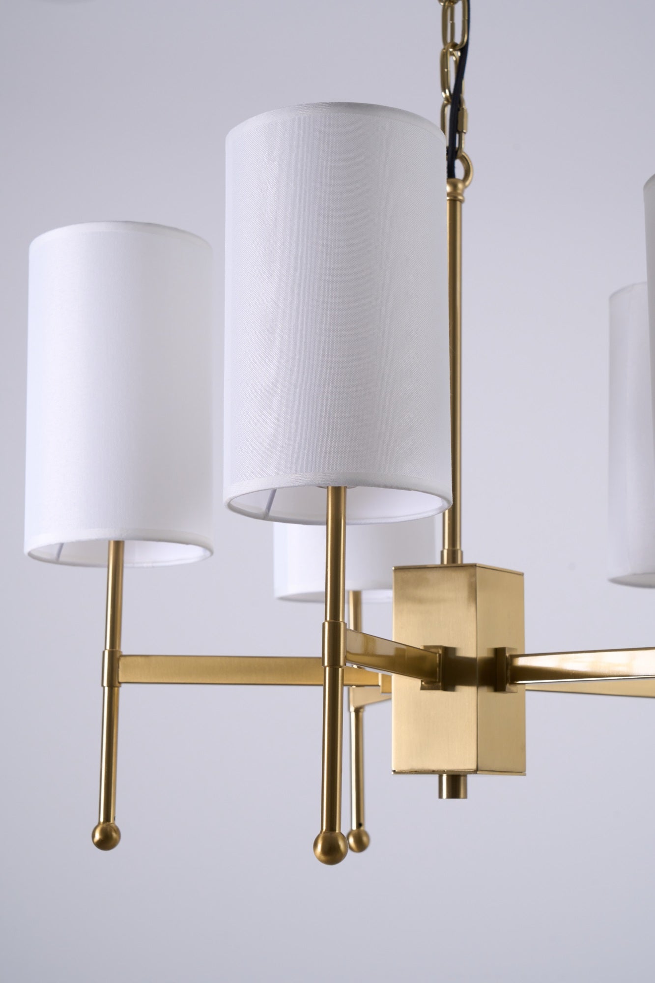 Brass Chandelier with Adjustable Height and Elegant Crystal Accents