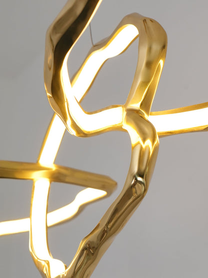 Elegant Brass Chandelier with Adjustable Arms and Ambient Lighting