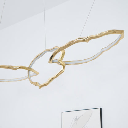 Elegant Brass Chandelier with Adjustable Arms and Ambient Lighting