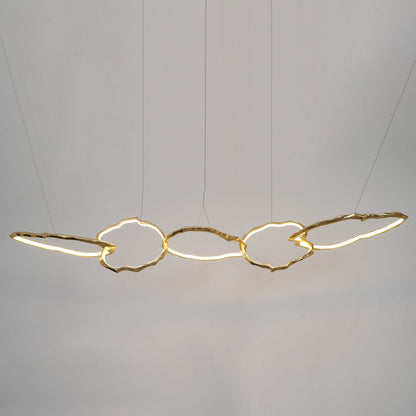 Elegant Brass Chandelier with Adjustable Arms and Ambient Lighting