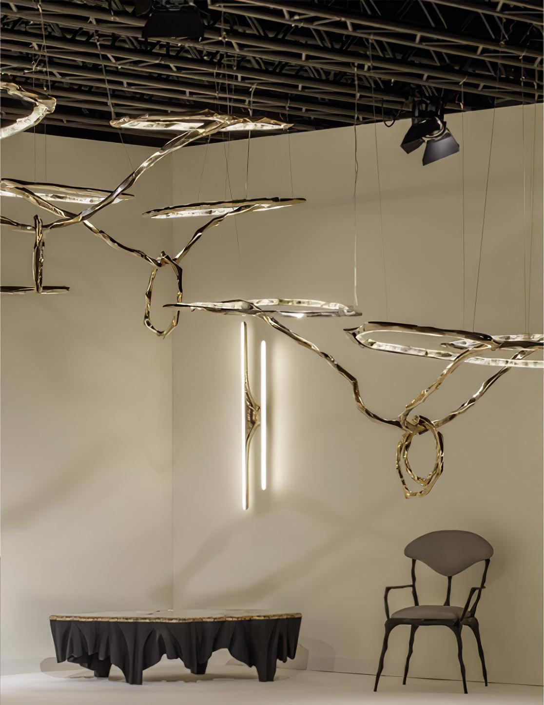 Elegant Brass Chandelier with Adjustable Arms and Ambient Lighting