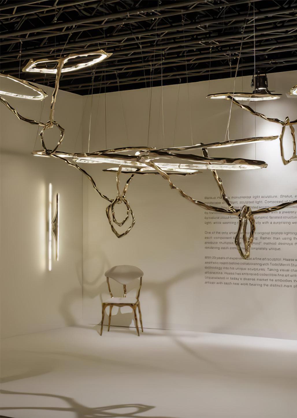 Elegant Brass Chandelier with Adjustable Arms and Ambient Lighting