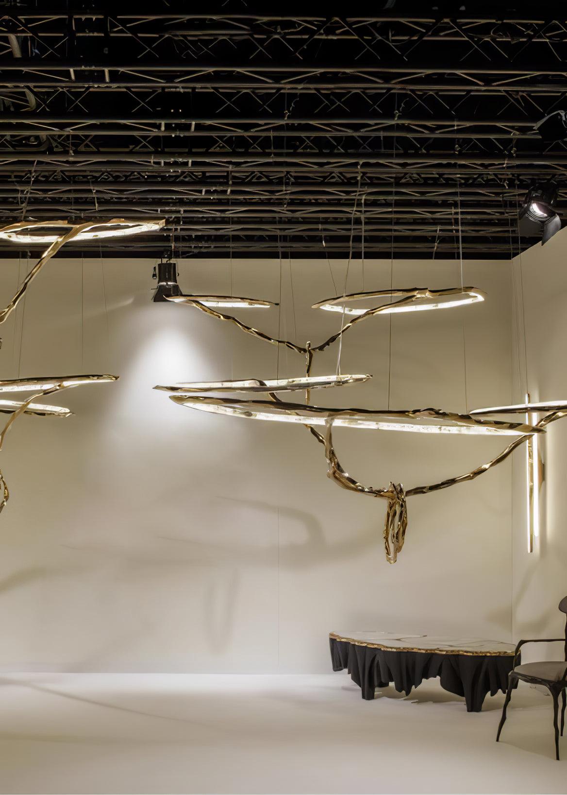 Elegant Brass Chandelier with Adjustable Arms and Ambient Lighting