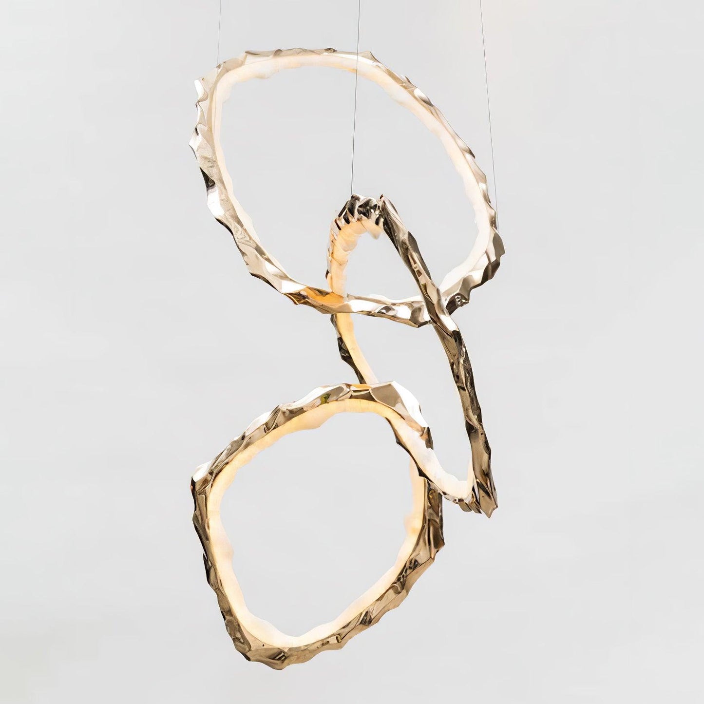 Elegant Brass Chandelier with Adjustable Arms and Ambient Lighting