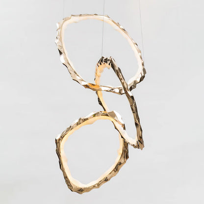 Elegant Brass Chandelier with Adjustable Arms and Ambient Lighting