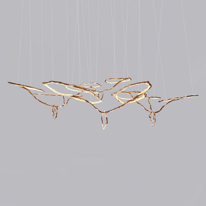 Elegant Brass Chandelier with Adjustable Arms and Ambient Lighting