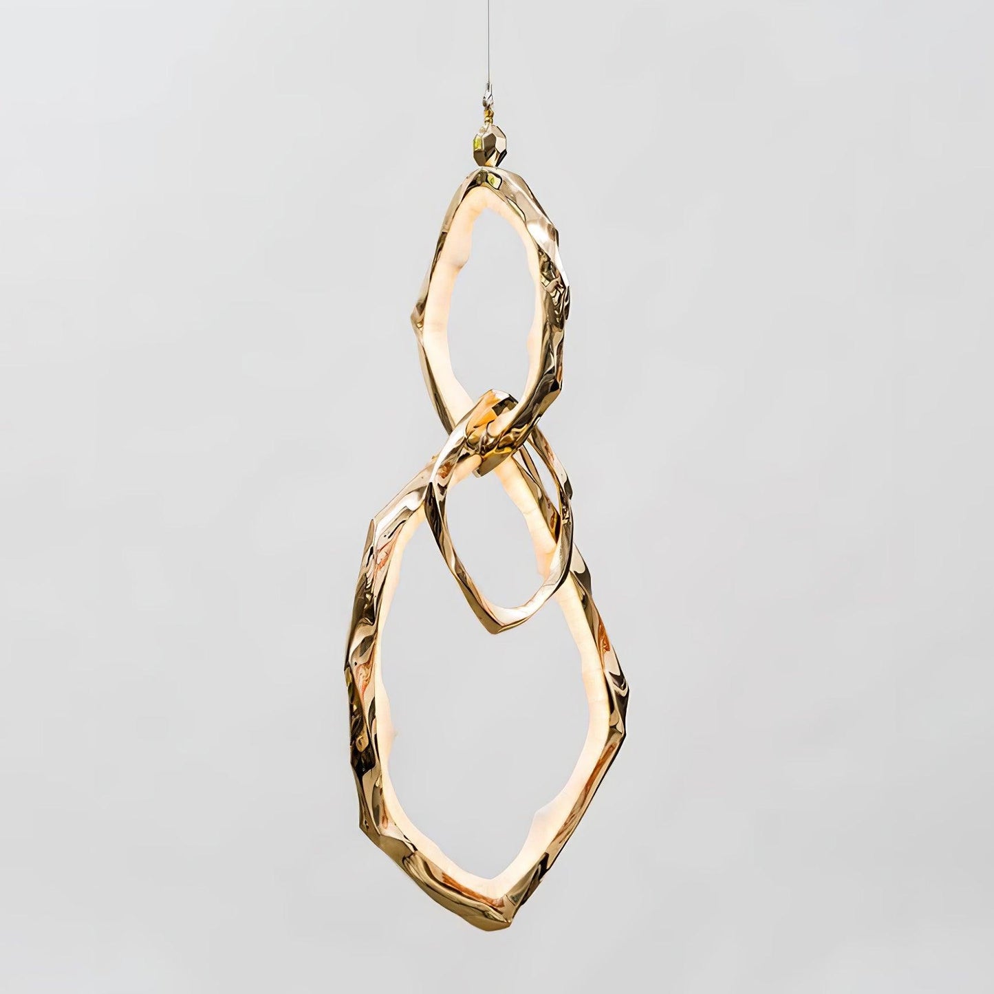 Elegant Brass Chandelier with Adjustable Arms and Ambient Lighting
