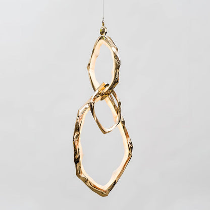 Elegant Brass Chandelier with Adjustable Arms and Ambient Lighting