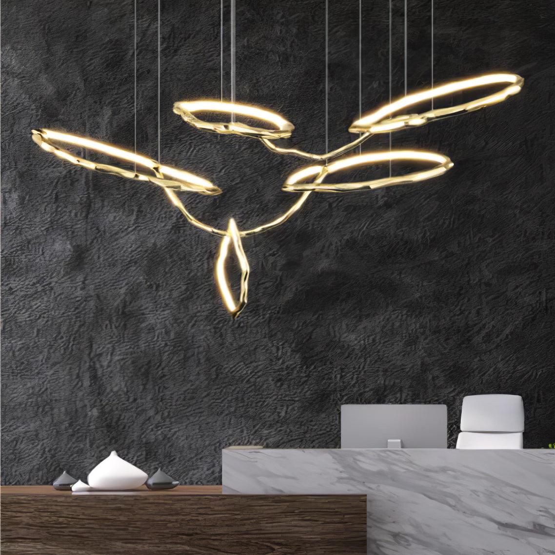 Elegant Brass Chandelier with Adjustable Arms and Ambient Lighting