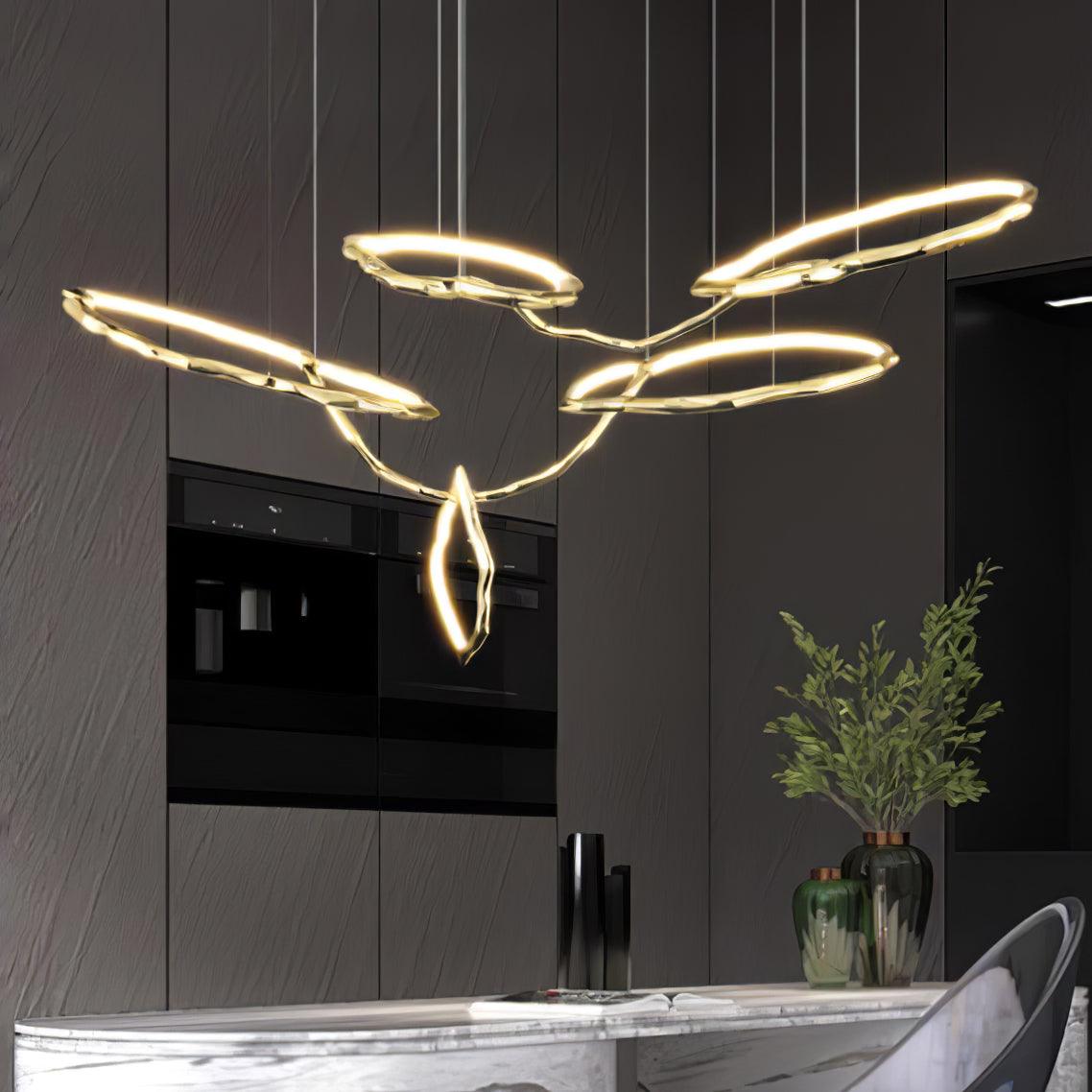 Elegant Brass Chandelier with Adjustable Arms and Ambient Lighting