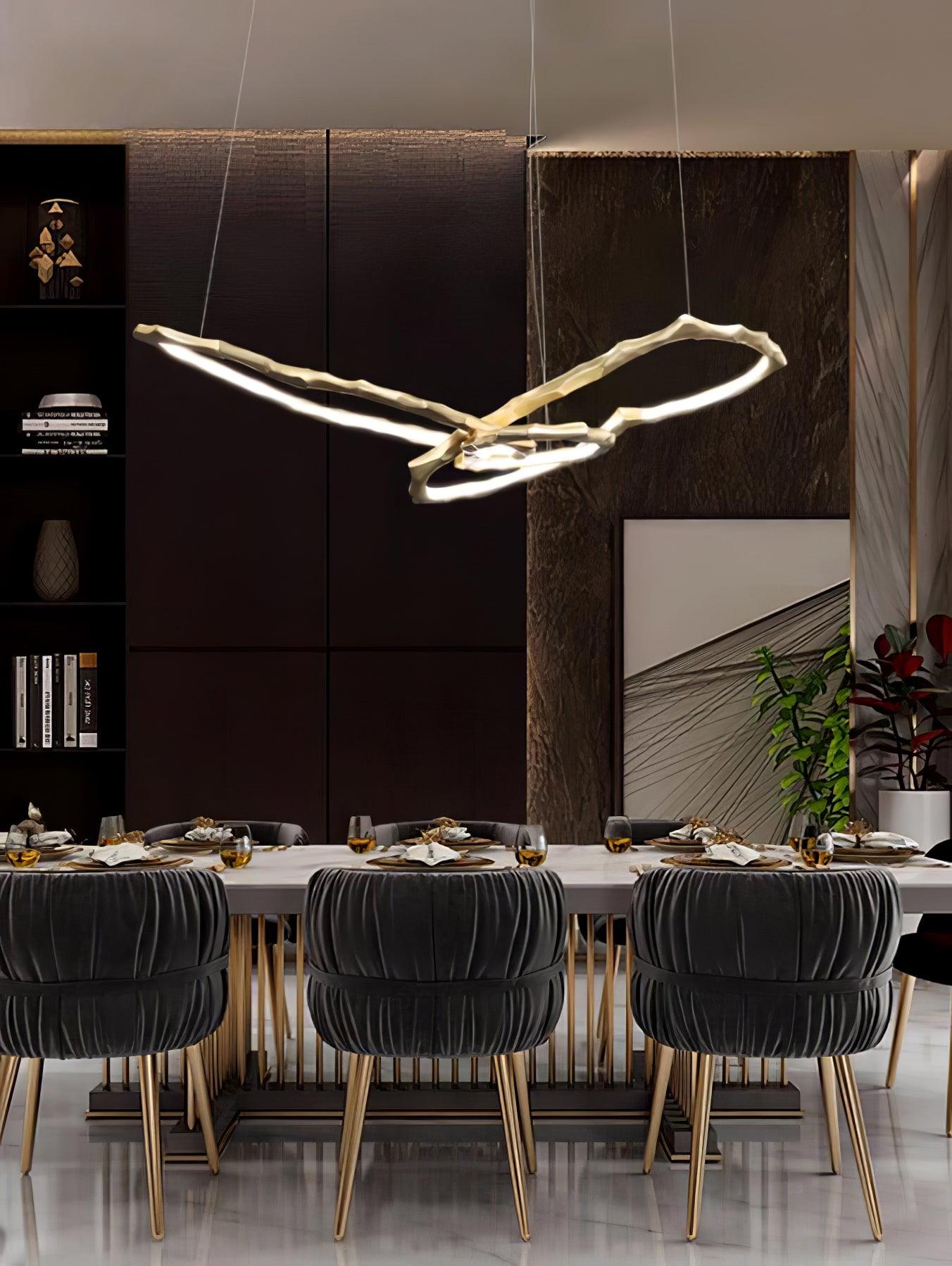 Elegant Brass Chandelier with Adjustable Arms and Ambient Lighting