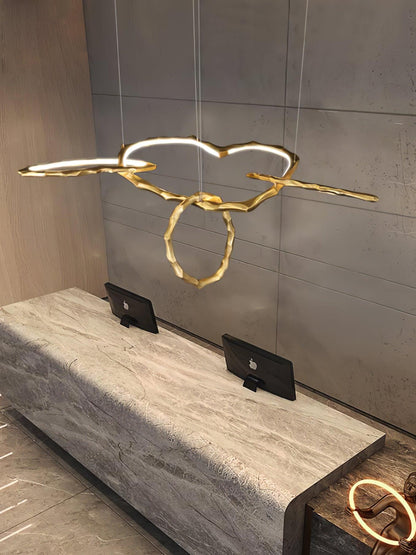 Elegant Brass Chandelier with Adjustable Arms and Ambient Lighting