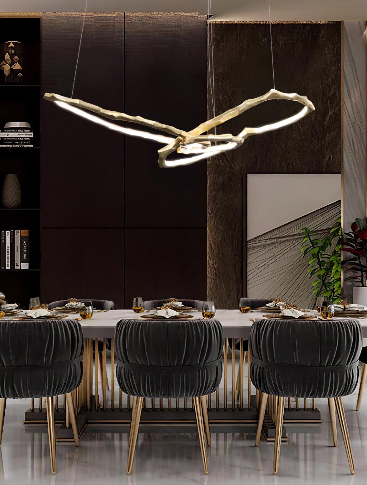 Elegant Brass Chandelier with Adjustable Arms and Ambient Lighting