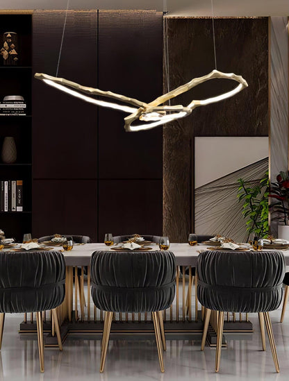 Elegant Brass Chandelier with Adjustable Arms and Ambient Lighting