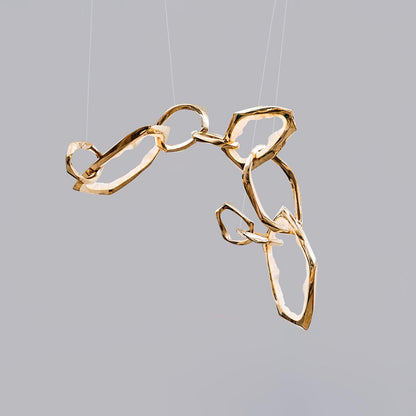 Elegant Brass Chandelier with Adjustable Arms and Ambient Lighting