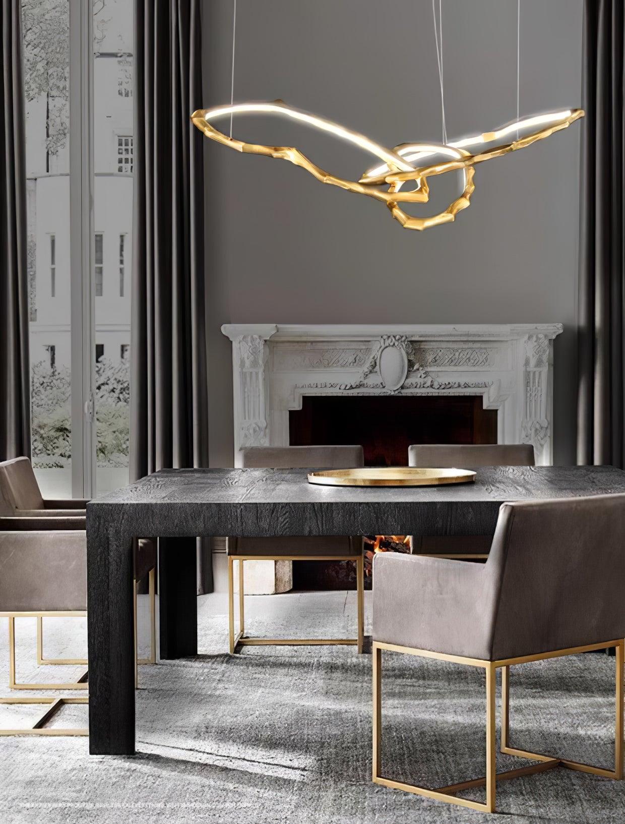 Elegant Brass Chandelier with Adjustable Arms and Ambient Lighting