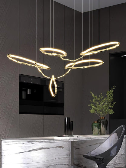 Elegant Brass Chandelier with Adjustable Arms and Ambient Lighting