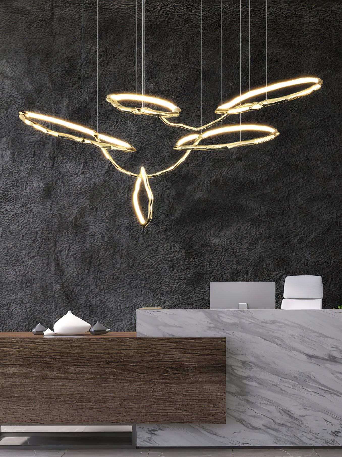 Elegant Brass Chandelier with Adjustable Arms and Ambient Lighting