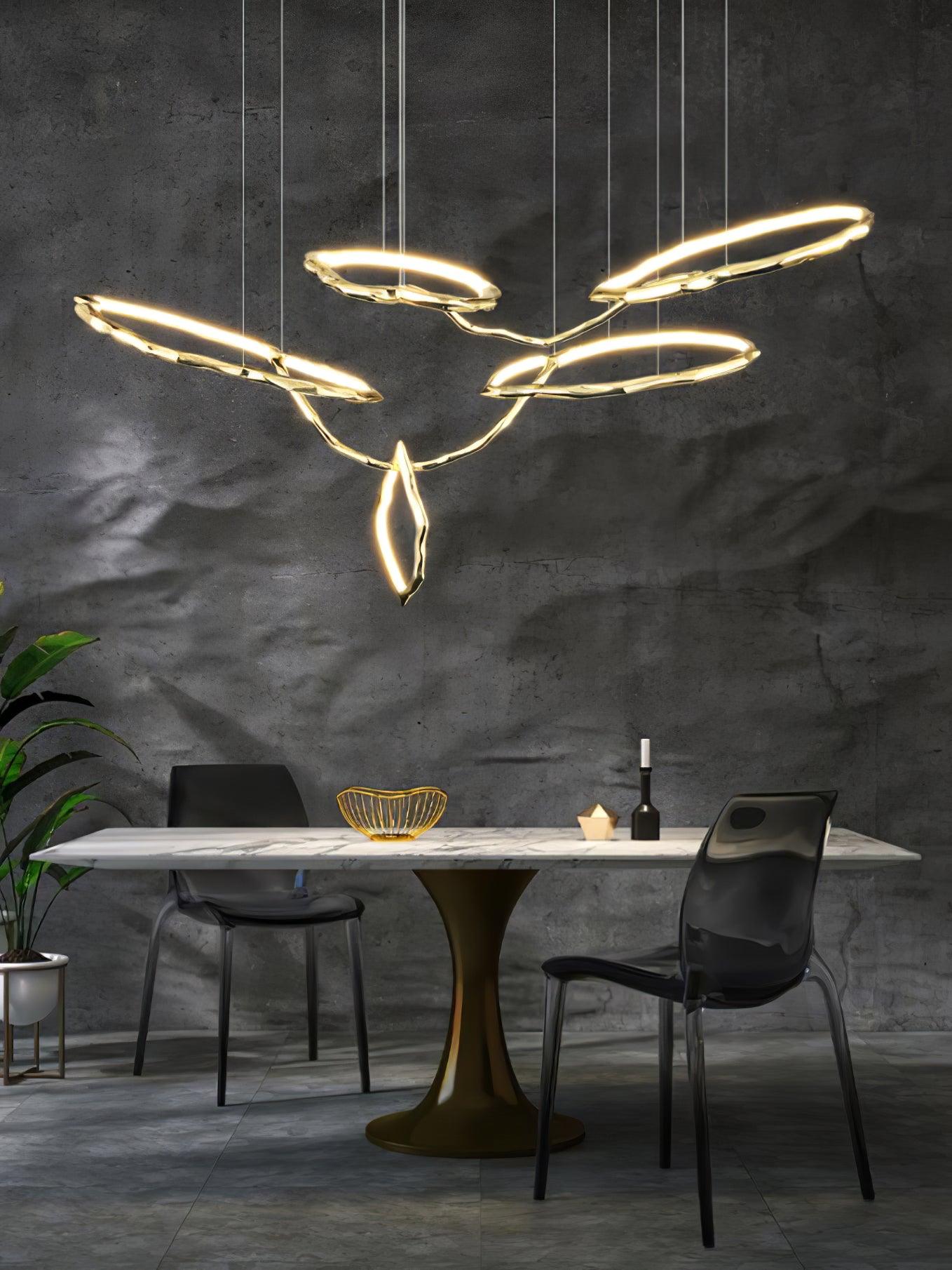Elegant Brass Chandelier with Adjustable Arms and Ambient Lighting