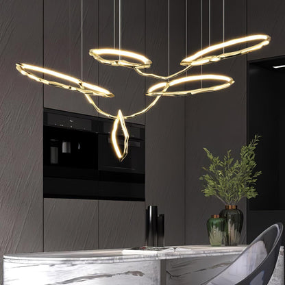 Elegant Brass Chandelier with Adjustable Arms and Ambient Lighting