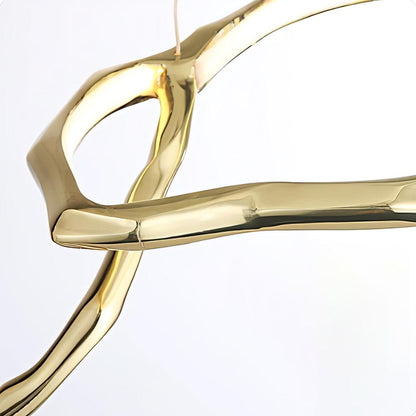Elegant Brass Chandelier with Adjustable Arms and Ambient Lighting