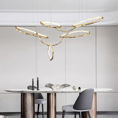 Elegant Brass Chandelier with Adjustable Arms and Ambient Lighting