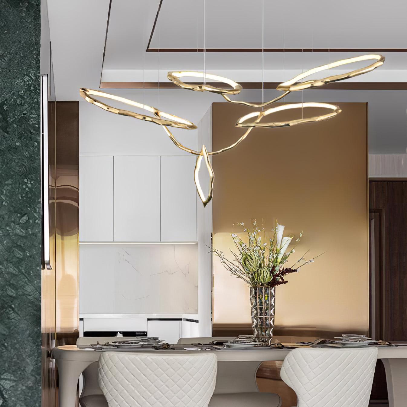 Elegant Brass Chandelier with Adjustable Arms and Ambient Lighting