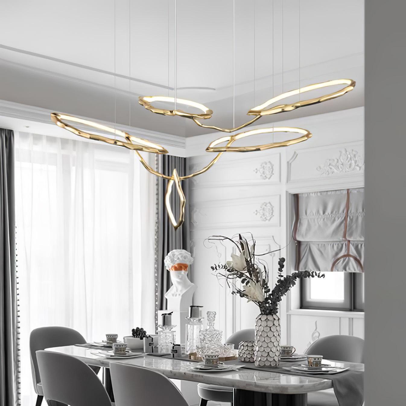 Elegant Brass Chandelier with Adjustable Arms and Ambient Lighting