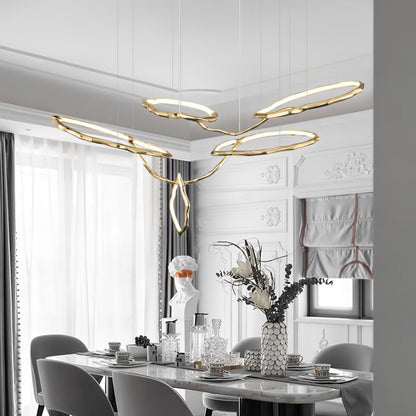 Elegant Brass Chandelier with Adjustable Arms and Ambient Lighting