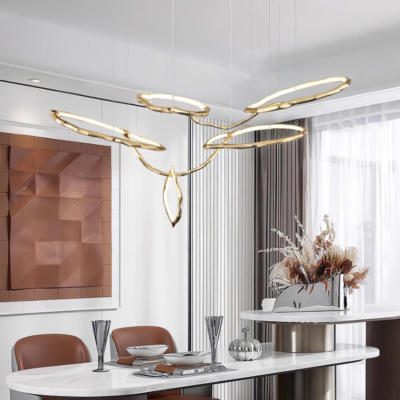 Elegant Brass Chandelier with Adjustable Arms and Ambient Lighting