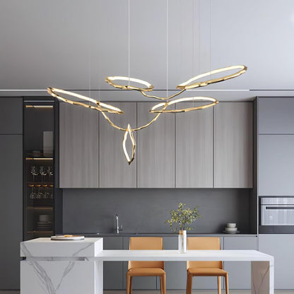 Elegant Brass Chandelier with Adjustable Arms and Ambient Lighting