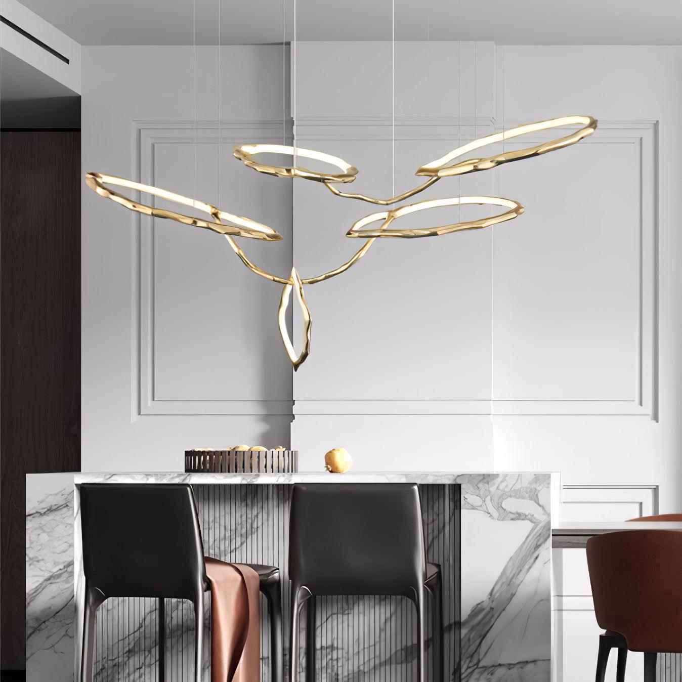 Elegant Brass Chandelier with Adjustable Arms and Ambient Lighting