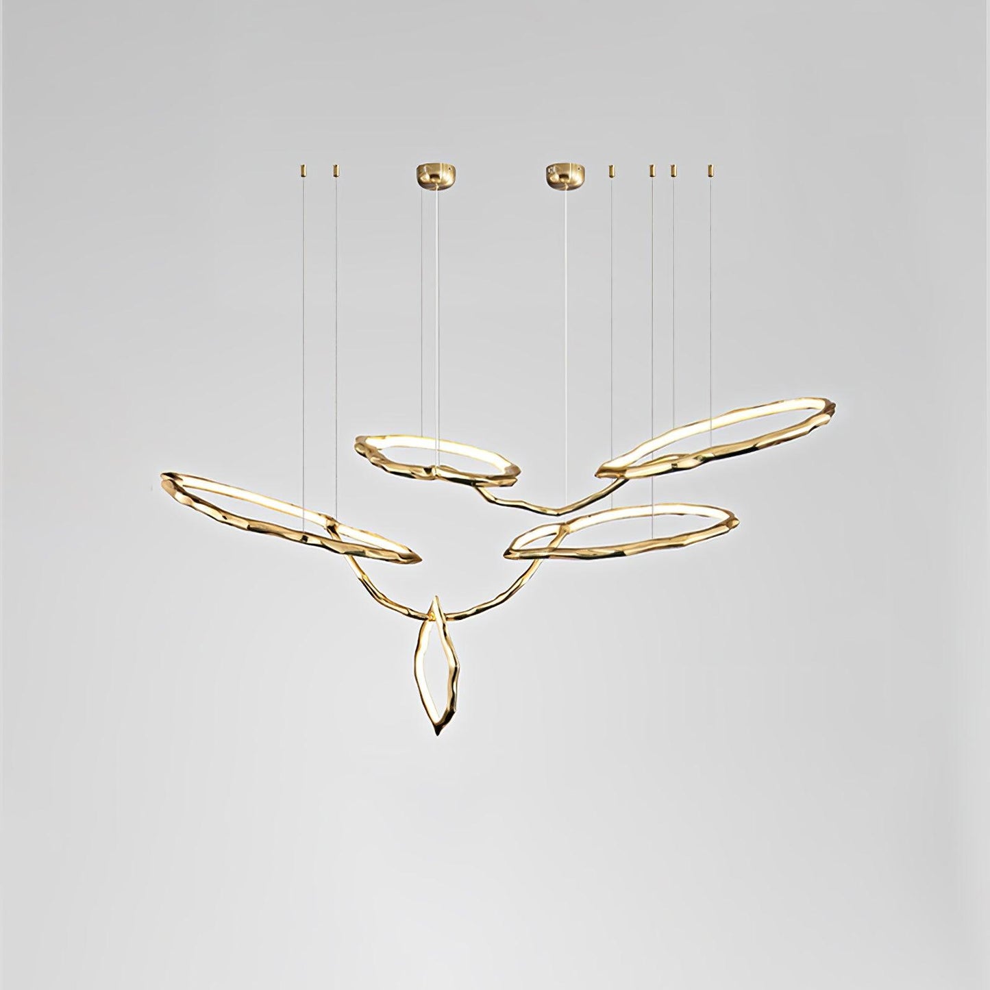 Elegant Brass Chandelier with Adjustable Arms and Ambient Lighting
