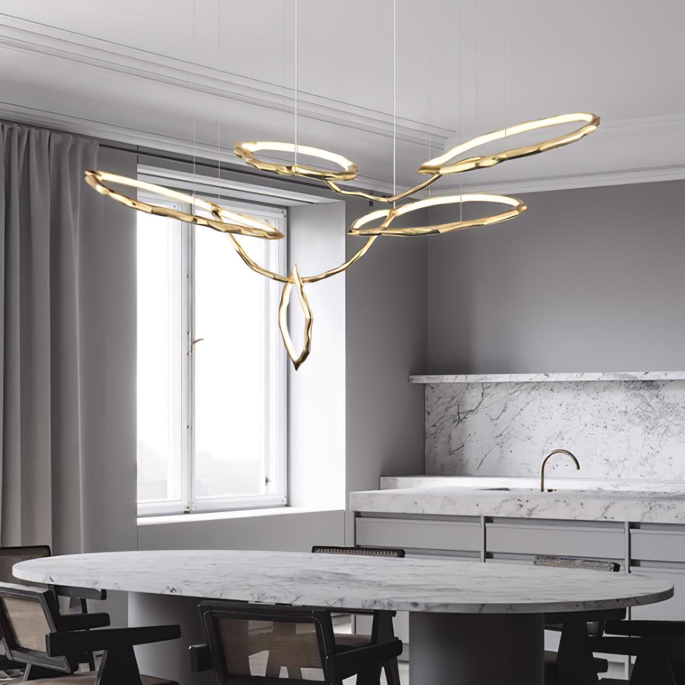 Elegant Brass Chandelier with Adjustable Arms and Ambient Lighting