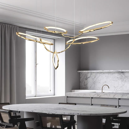Elegant Brass Chandelier with Adjustable Arms and Ambient Lighting