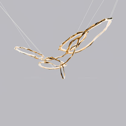 Elegant Brass Chandelier with Adjustable Arms and Ambient Lighting