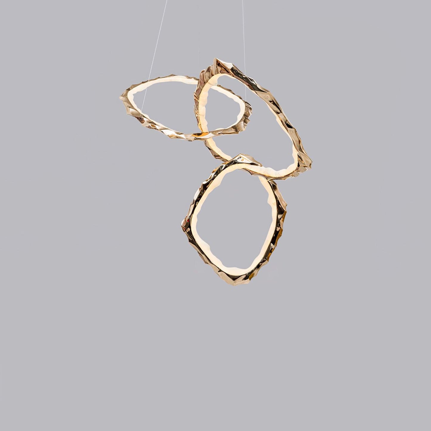 Elegant Brass Chandelier with Adjustable Arms and Ambient Lighting