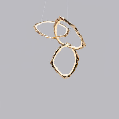 Elegant Brass Chandelier with Adjustable Arms and Ambient Lighting