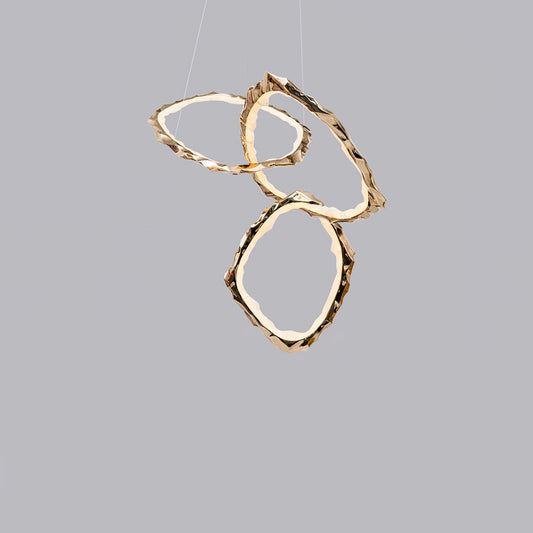 Elegant Brass Chandelier with Adjustable Arms and Ambient Lighting