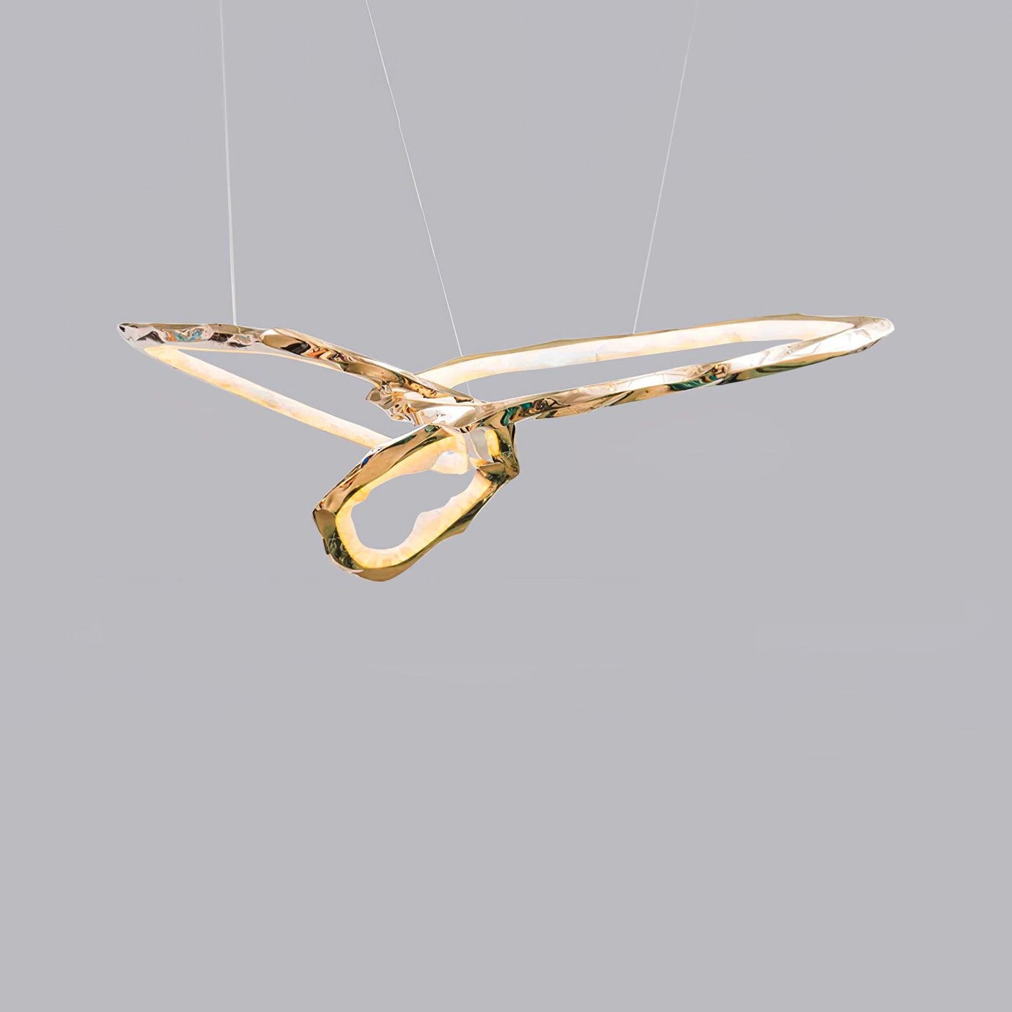 Elegant Brass Chandelier with Adjustable Arms and Ambient Lighting