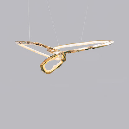 Elegant Brass Chandelier with Adjustable Arms and Ambient Lighting