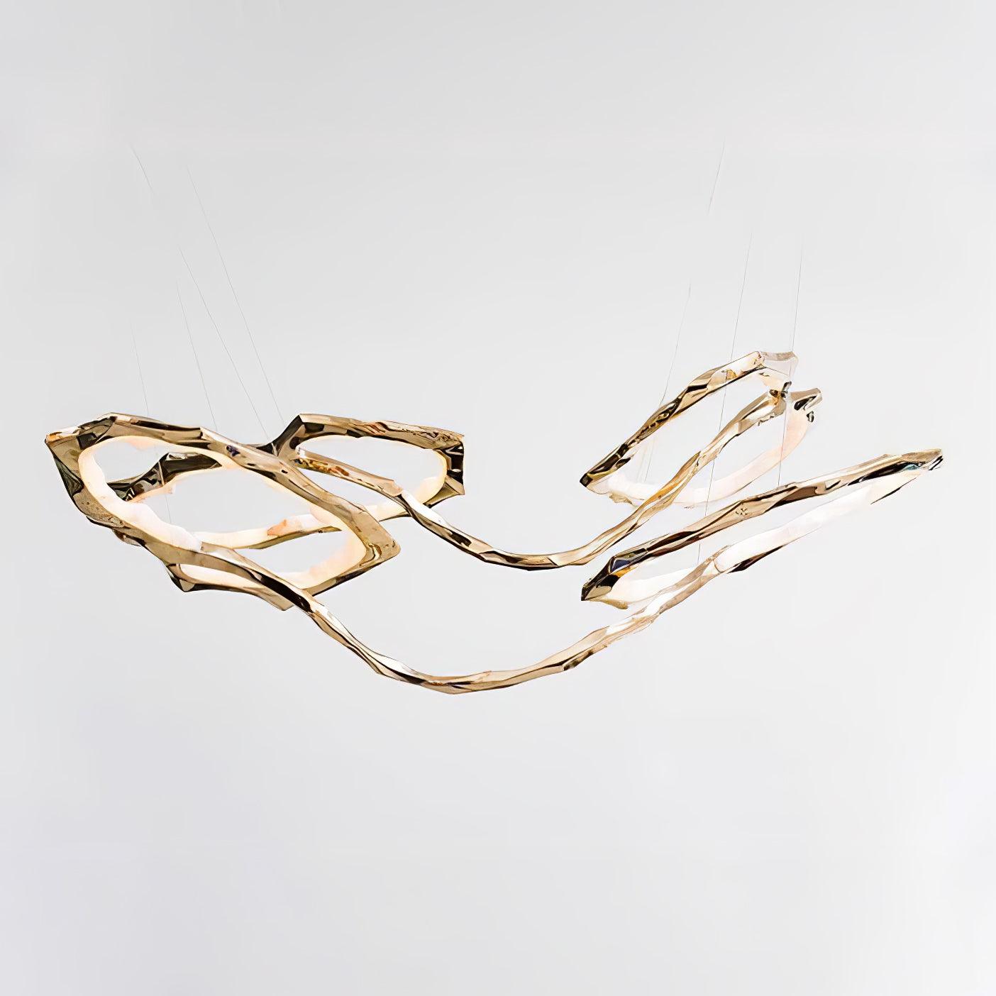 Elegant Brass Chandelier with Adjustable Arms and Ambient Lighting